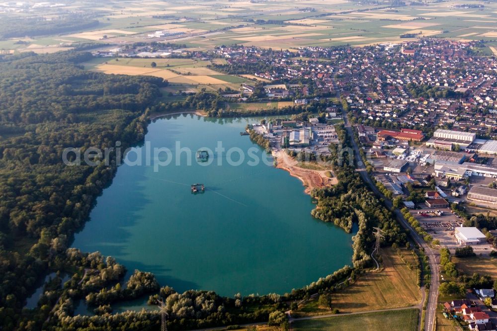 Schutterwald from above - Village on the lake bank areas of a lake in Schutterwald in the state Baden-Wurttemberg, Germany
