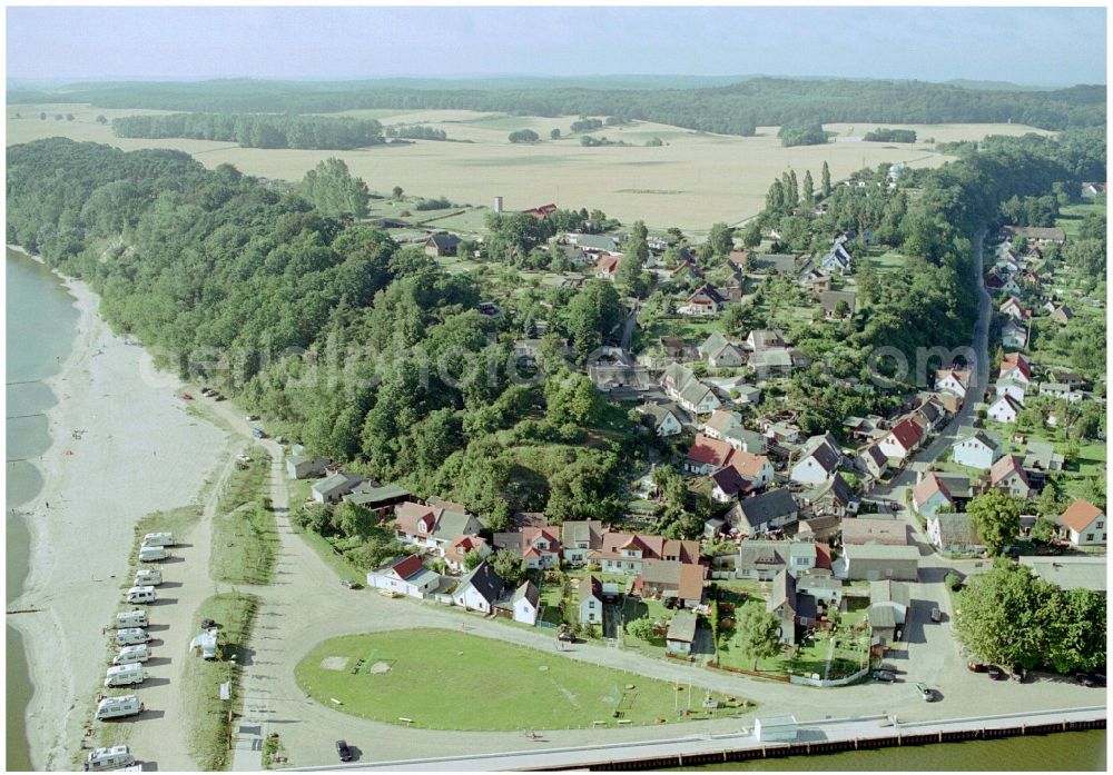 Kamminke from the bird's eye view: Village on the lake bank areas of Stettiner Haff in Kamminke in the state Mecklenburg - Western Pomerania, Germany