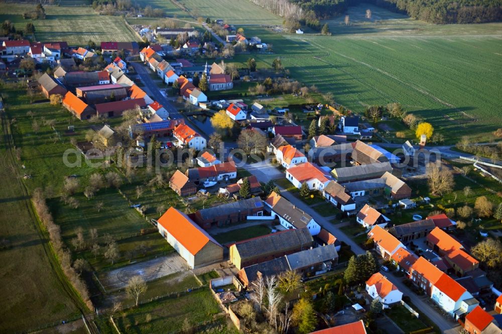 Aerial photograph Senst - Agricultural land and field borders surround the settlement area of the village in Senst in the state Saxony-Anhalt, Germany