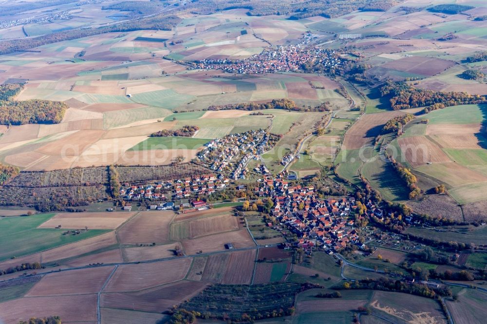Aerial image Unteraltertheim - Agricultural land and field borders surround the settlement area of the village in Unteraltertheim in the state Bavaria, Germany
