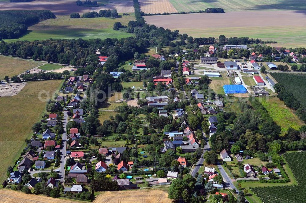 Aerial image Wesendahl - Agricultural land and field borders surround the settlement area of the village in Wesendahl in the state Brandenburg, Germany