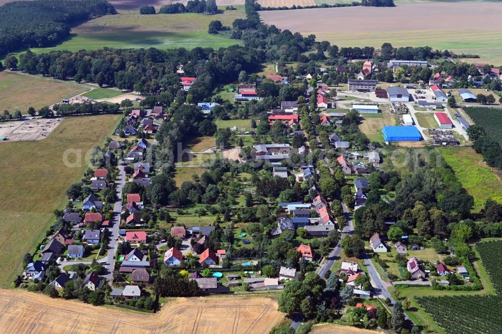 Aerial photograph Wesendahl - Agricultural land and field borders surround the settlement area of the village in Wesendahl in the state Brandenburg, Germany