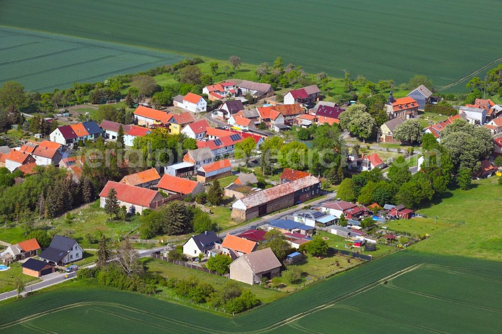 Wolferschwenda from the bird's eye view: Agricultural land and field borders surround the settlement area of the village in Wolferschwenda in the state Thuringia, Germany
