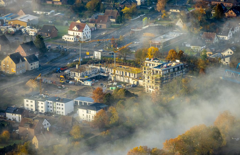 Aerial image Hamm-Bossendorf - Haze over the Construction site for the construction of a multi-family residential and business district Katharinen-Hoefe on Kapellenweg in Hamm-Bossendorf in the state North Rhine-Westphalia, Germany
