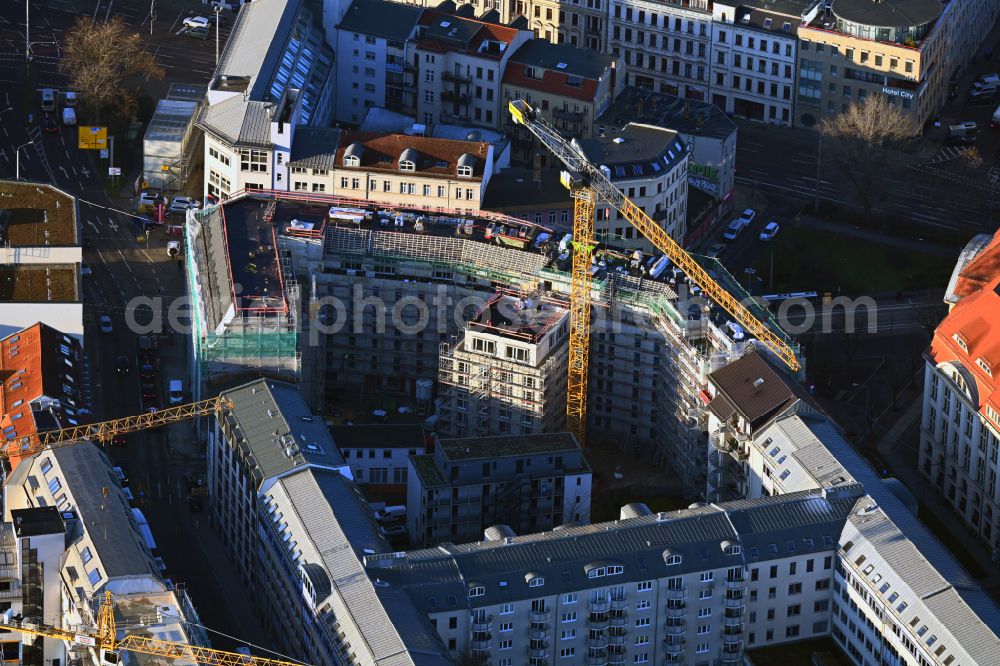 Leipzig from the bird's eye view: Construction site for the new residential and commercial Corner house - building on street Wilhelm-Liebknecht-Platz - Erich-Weinert-Strasse in the district Zentrum in Leipzig in the state Saxony, Germany