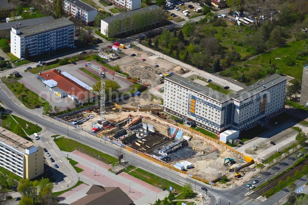 Aerial image Berlin - Construction site for the new residential and commercial Corner house - building on Marzahner Chaussee Ecke Allee of Kosmonauten in the district Marzahn in Berlin, Germany