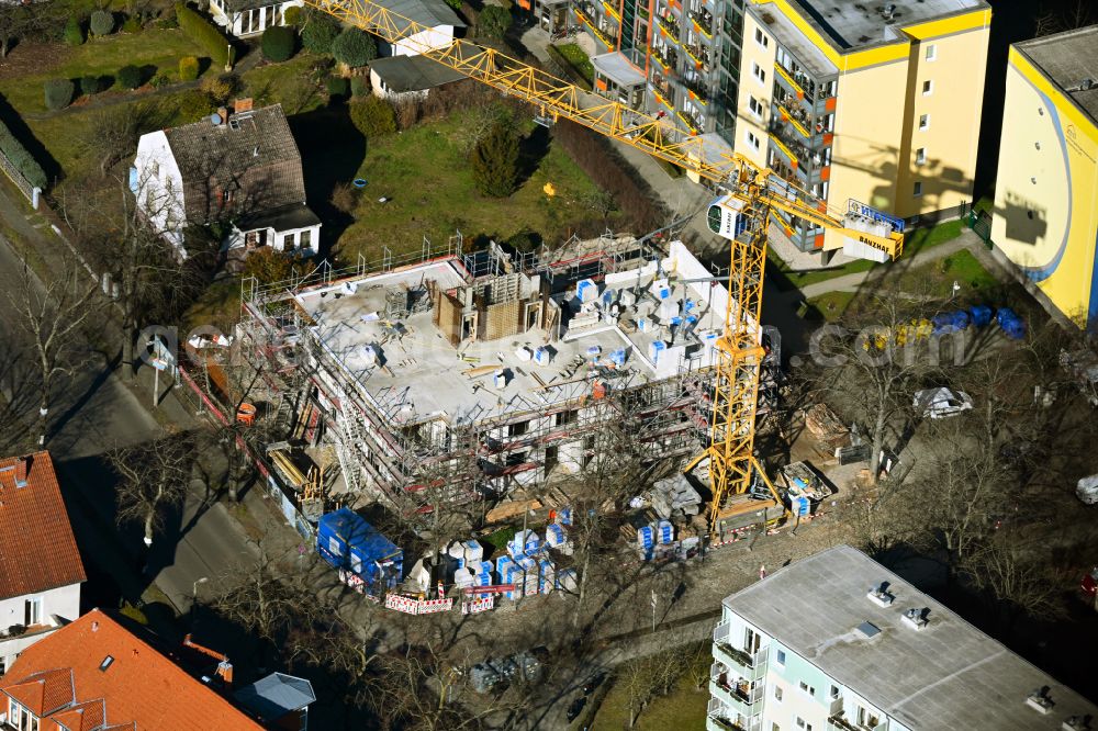 Aerial image Berlin - Construction site for the new residential and commercial Corner house - building on street Schillerstrasse - Mozartstrasse in the district Wilhelmsruh in Berlin, Germany