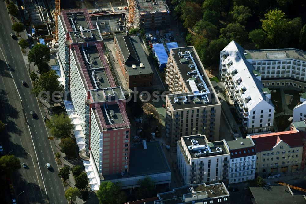 Aerial image Berlin - Construction site for the new residential and commercial Corner house - building on Rathausstrasse in the district Lichtenberg in Berlin, Germany