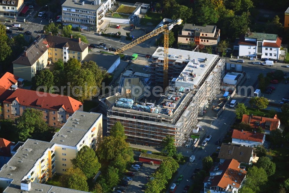 München from above - Construction site for the new residential and commercial Corner house - building Wiesenfelser Strasse corner Limestrasse in the district Aubing-Lochhausen-Langwied in Munich in the state Bavaria, Germany