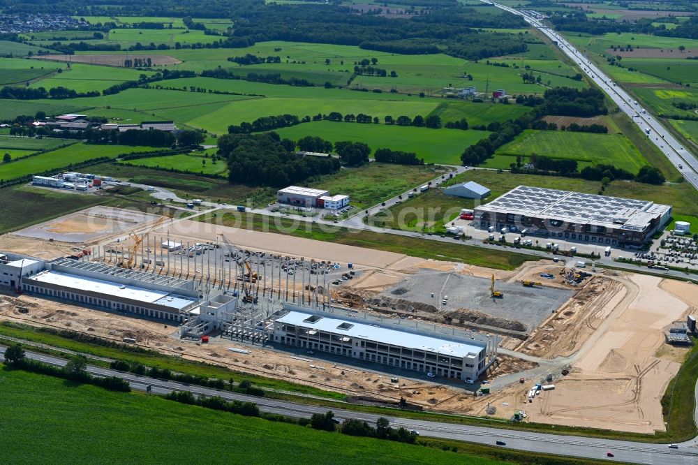 Neumünster from above - EDEKA - Construction site for a warehouse and forwarding building with Frischelager on Eichhofpark in Neumuenster in the state Schleswig-Holstein, Germany