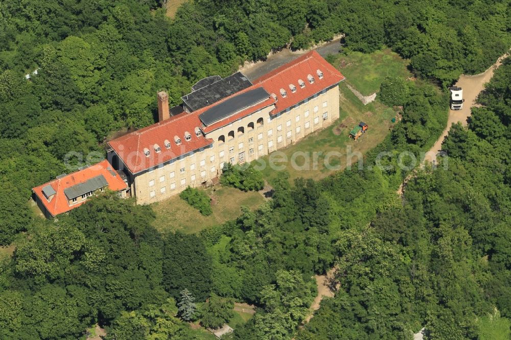 Bad Frankenhausen/Kyffhäuser from the bird's eye view: On a former vineyard on the southern slope of the Kyffhaeuser in Bad Frankenhausen in Thuringia is the building of a former children's sanatorium. The kids spa facility was built under supervision of architect Georg Wunschmann. In the past century, especially children treated with chronic respiratory diseases here. Due to its exposed location, the building is one of the landmarks of the city