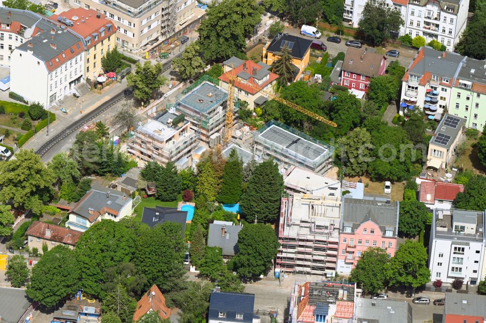 Berlin from above - Construction site for the new construction of a detached house in a family house - settlement along the Germanenstrasse on street Sachsenstrasse in the district Niederschoenhausen in Berlin, Germany