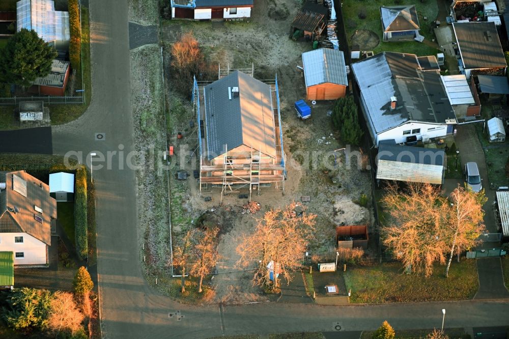 Aerial photograph Vogelsdorf - Construction site for the new construction of a detached house in a family house - settlement along the Heideweg corner Friedrich-Ebert-Strasse in Vogelsdorf in the state Brandenburg, Germany