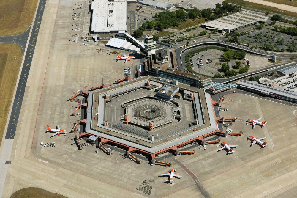 Berlin from the bird's eye view: Flight operations at the terminal of the airport Berlin - Tegel