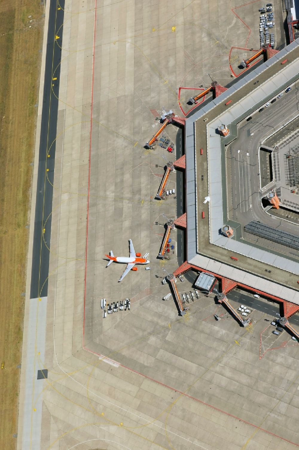 Berlin from above - Flight operations at the terminal of the airport Berlin - Tegel