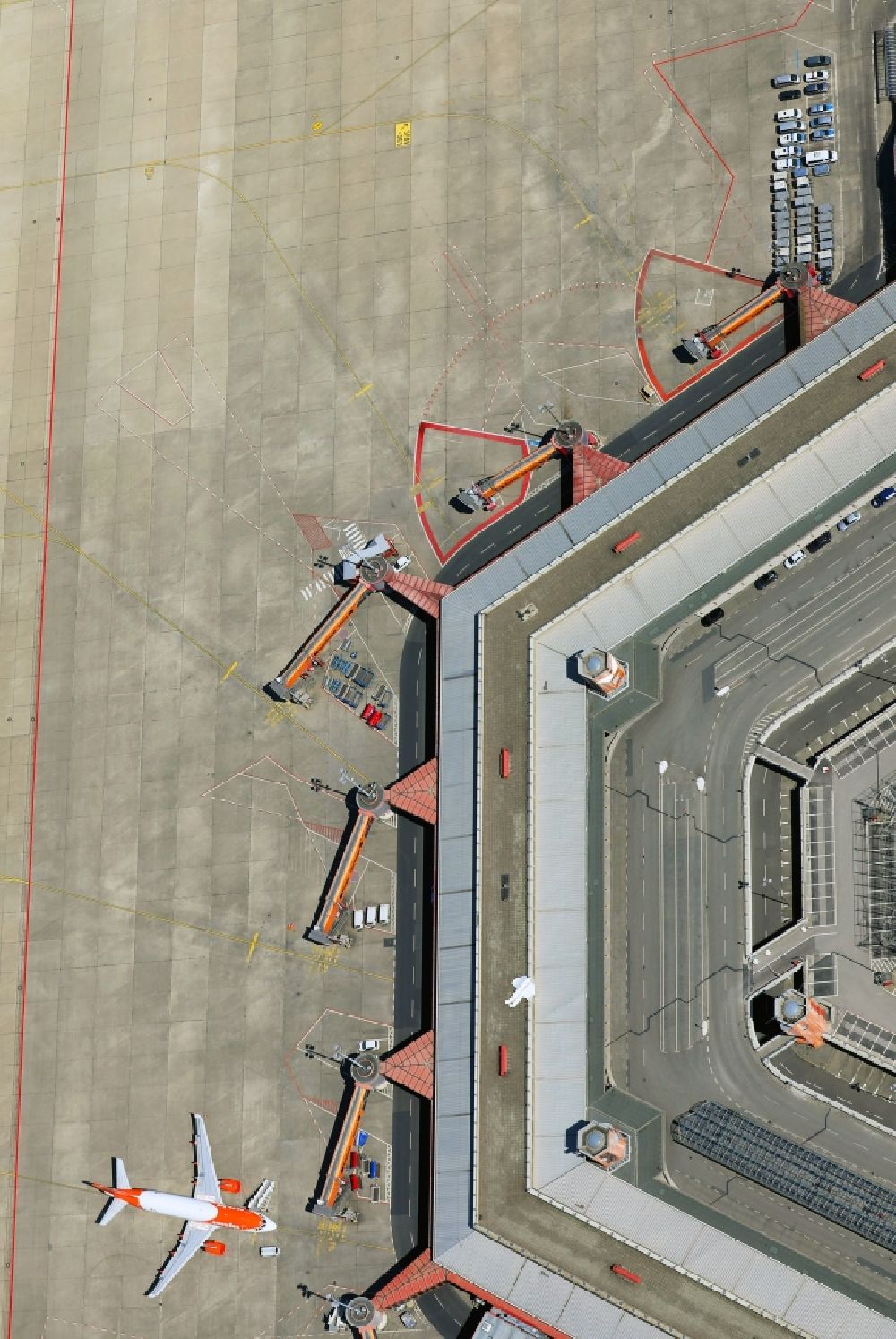 Berlin from the bird's eye view: Flight operations at the terminal of the airport Berlin - Tegel