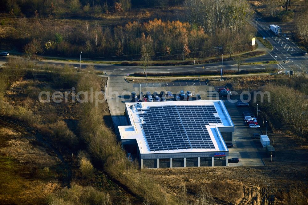 Bernau from the bird's eye view: Building of the shopping center ALDI on Schoenower Chaussee in the district Schoenow in Bernau in the state Brandenburg, Germany