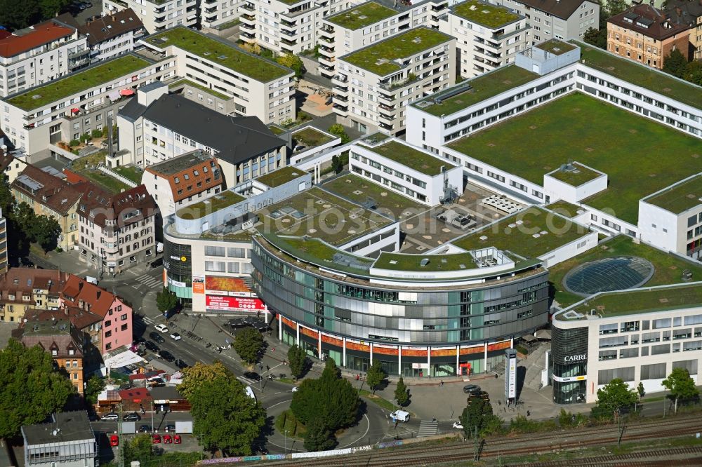 Aerial photograph Stuttgart - Building of the shopping center of CARRE Bad Cannstatt on Wildunger Strasse corner Daimlerstrasse in the district Seelberg in Stuttgart in the state Baden-Wuerttemberg, Germany. The building complex was designed by the EPA Planungsgruppe GmbH