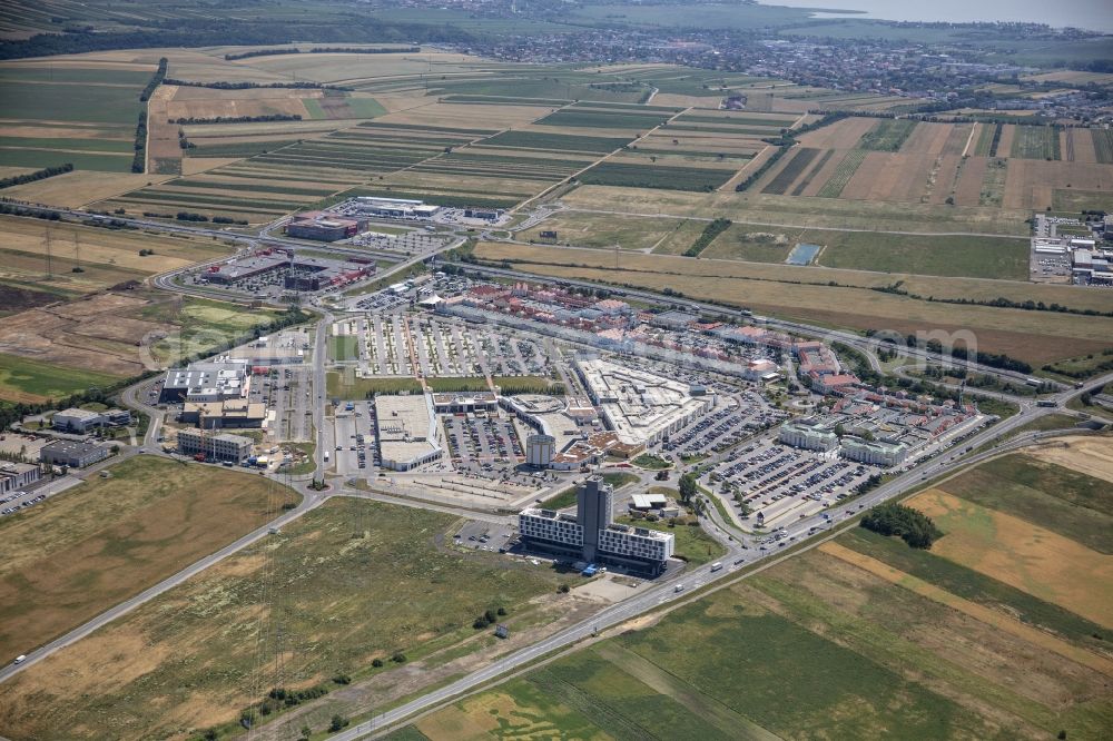 Aerial image Parndorf - Building of the shopping center Parndorf Fashion Outlet in Parndorf in Burgenland, Austria