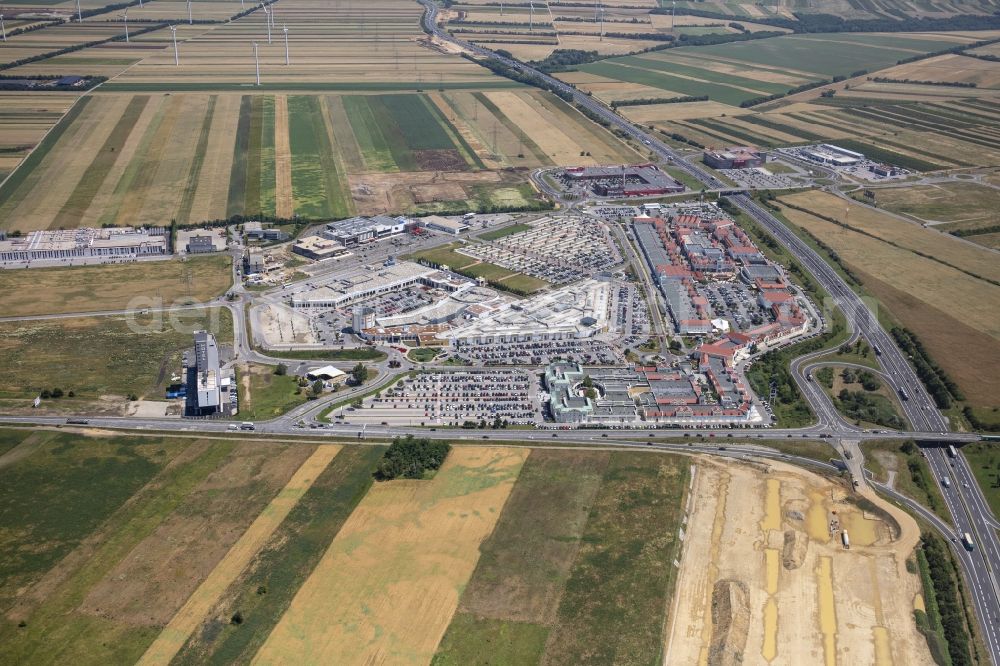 Parndorf from the bird's eye view: Building of the shopping center Parndorf Fashion Outlet in Parndorf in Burgenland, Austria