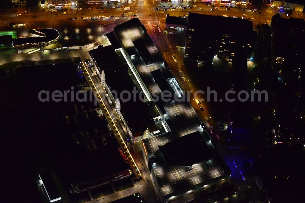 Aerial photograph Berlin - Night image with a view over the shoppingcenter Tempelhofer Hafen at the Friedrich-Karl-Strasse in the district Tempelhof-Schoeneberg in Berlin