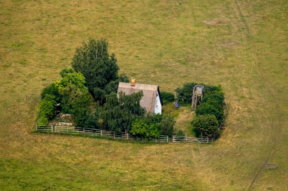 Ludorf from the bird's eye view: Single house on structures of a field landscape in Ludorf in the state Mecklenburg - Western Pomerania