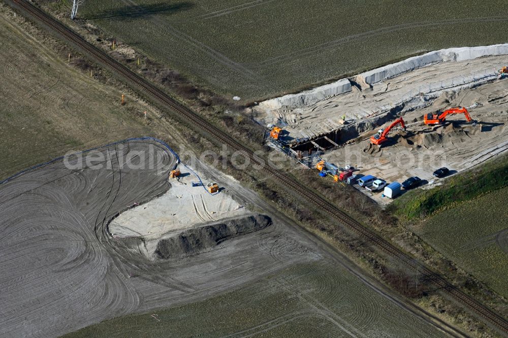Aerial image Friedersdorf - Construction site with earthworks and landfills on train line crossing for the laying of pipelines of the new Europaeischen Gas-Anbindungsleitung ( Eugal ) in Friedersdorf in the state Brandenburg, Germany