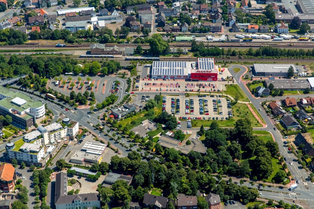 Aerial photograph Dorsten - Electronics - Specialists of the retail chain Media Markt at Europaplatz in Dorsten in North Rhine-Westphalia. In the background of the regional station Dorsten. On the left of the central bus station (ZOB) Dorsten