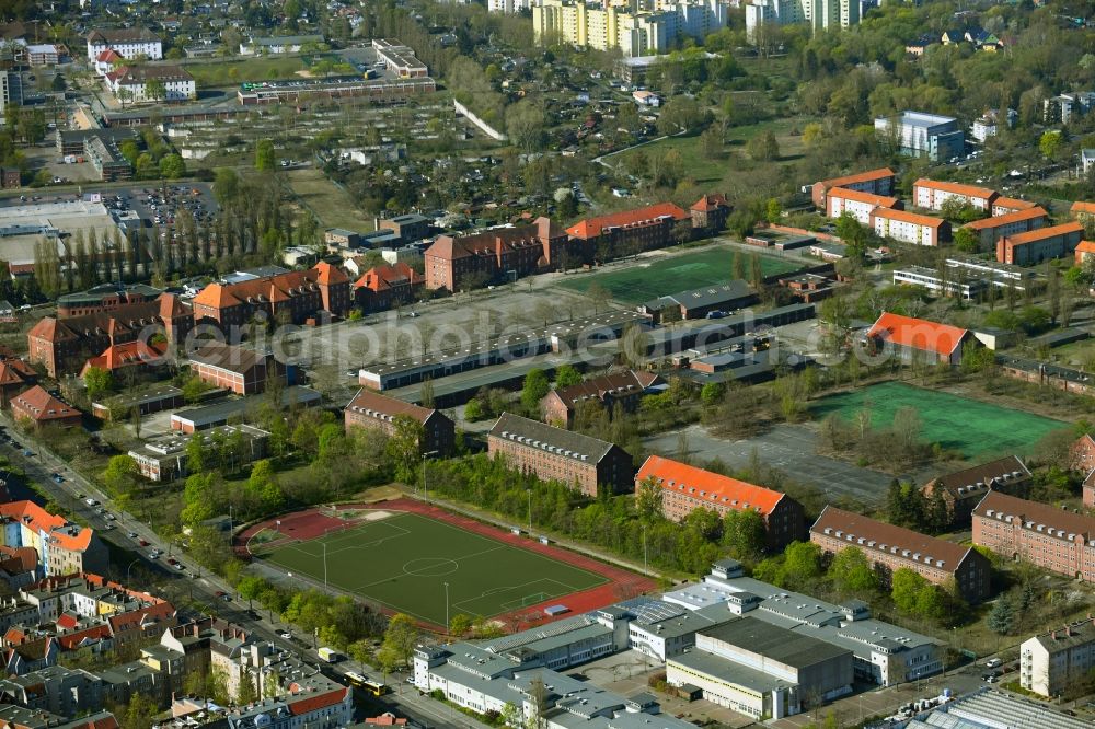 Berlin from above - Ensemble of sports grounds the Bertolt-Brecht-Schule and the fictional Reutlitz Prison in the multi-family housing estate between Seeburger Strasse and Wilhelmstrasse in the district Wilhelmstadt in Berlin, Germany