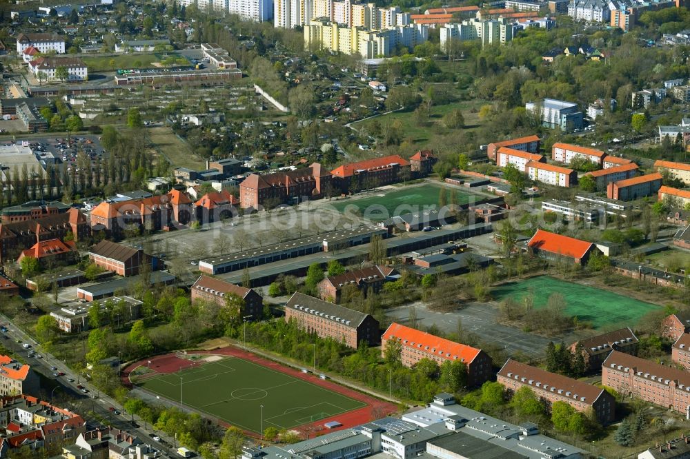 Berlin from the bird's eye view: Ensemble of sports grounds the Bertolt-Brecht-Schule and the fictional Reutlitz Prison in the multi-family housing estate between Seeburger Strasse and Wilhelmstrasse in the district Wilhelmstadt in Berlin, Germany