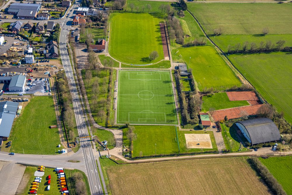 Haldern from the bird's eye view: Ensemble of sports grounds of sports club Haldern 1920 e.V. and commercial area in Haldern in the state of North Rhine-Westphalia