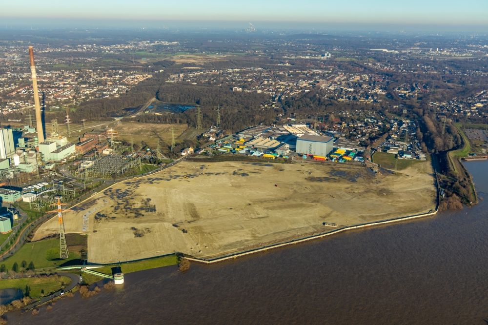 Duisburg from above - Development area of industrial wasteland Logport VI on shore of rhine river on destrict Walsum in Duisburg in the state North Rhine-Westphalia, Germany