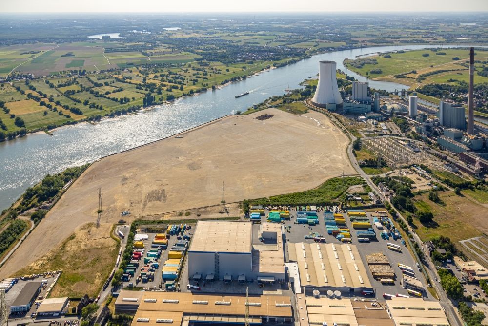Aerial photograph Duisburg - Development area of industrial wasteland Logport VI on shore of rhine river on destrict Walsum in Duisburg in the state North Rhine-Westphalia, Germany