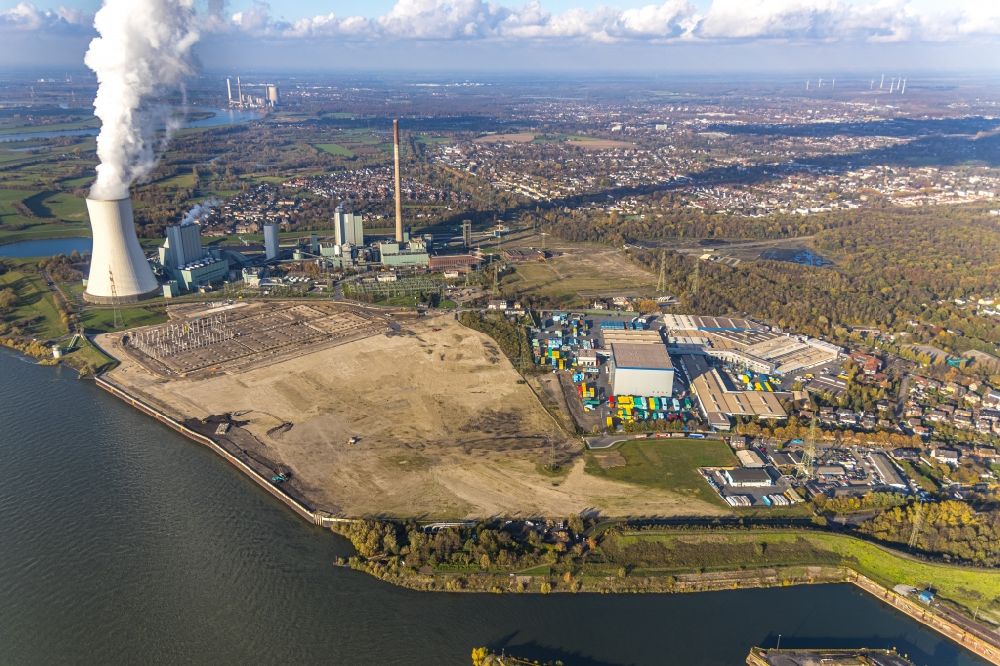 Aerial photograph Duisburg - Development area of industrial wasteland Logport VI on shore of rhine river on destrict Walsum in Duisburg in the state North Rhine-Westphalia, Germany