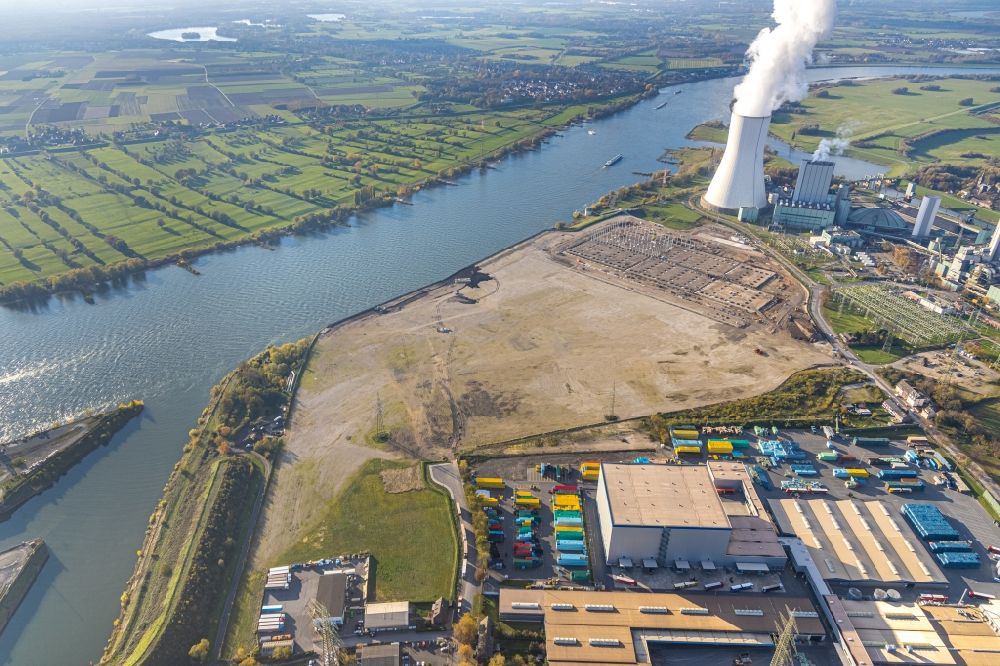 Duisburg from the bird's eye view: Development area of industrial wasteland Logport VI on shore of rhine river on destrict Walsum in Duisburg in the state North Rhine-Westphalia, Germany