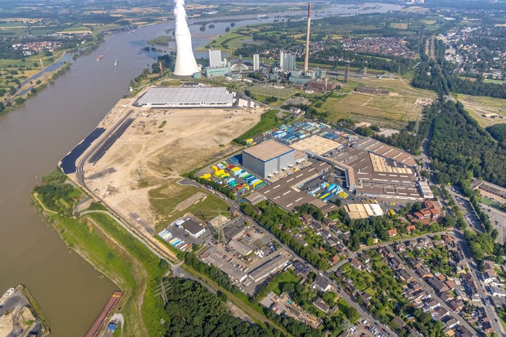 Duisburg from the bird's eye view: Development area of industrial wasteland Logport VI on shore of rhine river on destrict Walsum in Duisburg at Ruhrgebiet in the state North Rhine-Westphalia, Germany