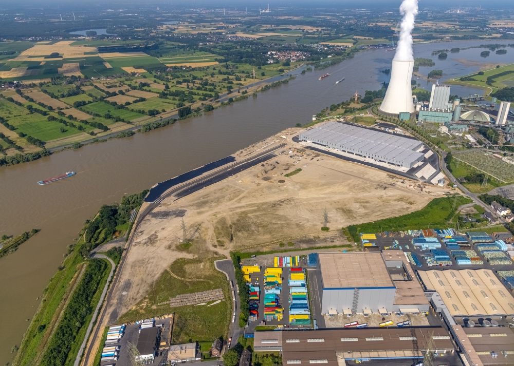Aerial photograph Duisburg - Development area of industrial wasteland Logport VI on shore of rhine river on destrict Walsum in Duisburg at Ruhrgebiet in the state North Rhine-Westphalia, Germany
