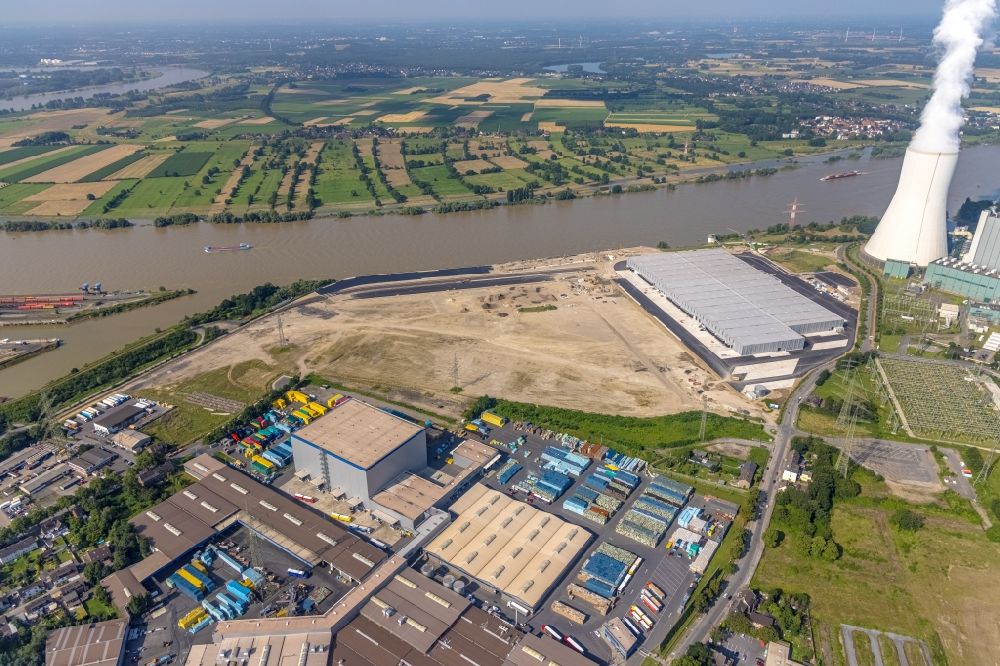 Duisburg from the bird's eye view: Development area of industrial wasteland Logport VI on shore of rhine river on destrict Walsum in Duisburg at Ruhrgebiet in the state North Rhine-Westphalia, Germany