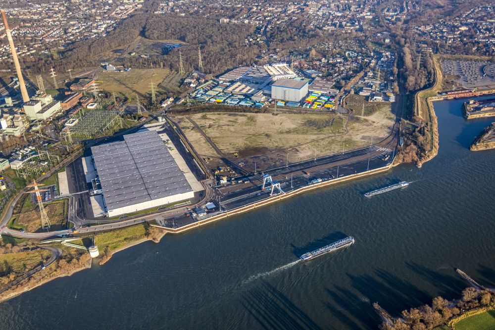 Aerial image Duisburg - Development area of industrial wasteland Logport VI on shore of rhine river on destrict Walsum in Duisburg at Ruhrgebiet in the state North Rhine-Westphalia, Germany