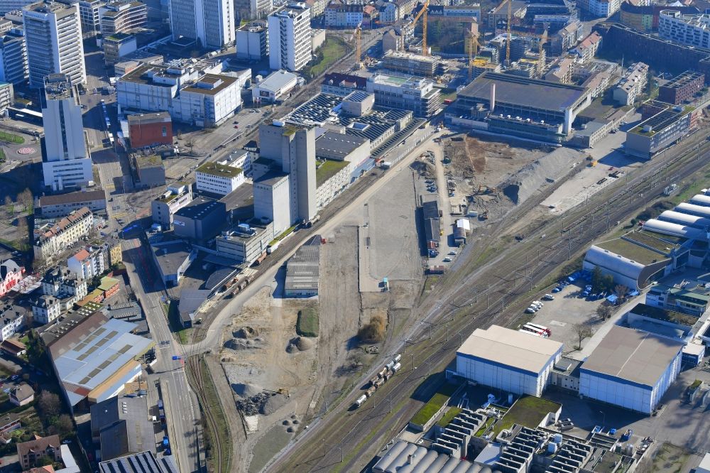 Basel from above - Development area of industrial wasteland Lysbuechel Areal on Lysbuechelstrasse in the district Sankt Johann in Basel, Switzerland