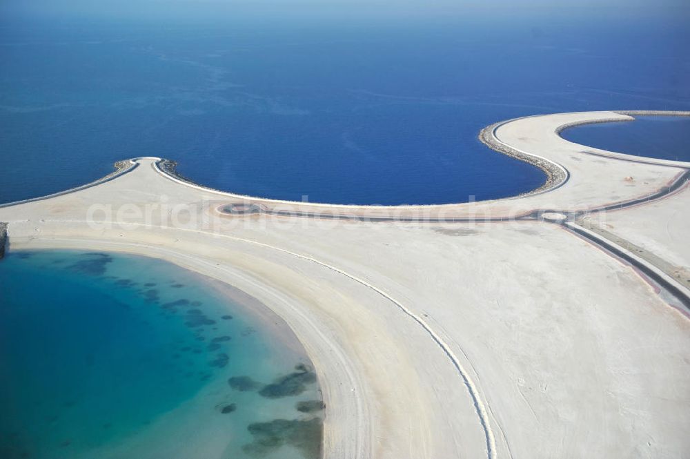 Ras Al Khaimah from above - Al Marjan Island is an artificial archipelago in the arab emirate Ras Al Khaimah. It is part of the Al Hamra Village Project. In the future, the archipelago is meant to be the arterial road for the region's tourism