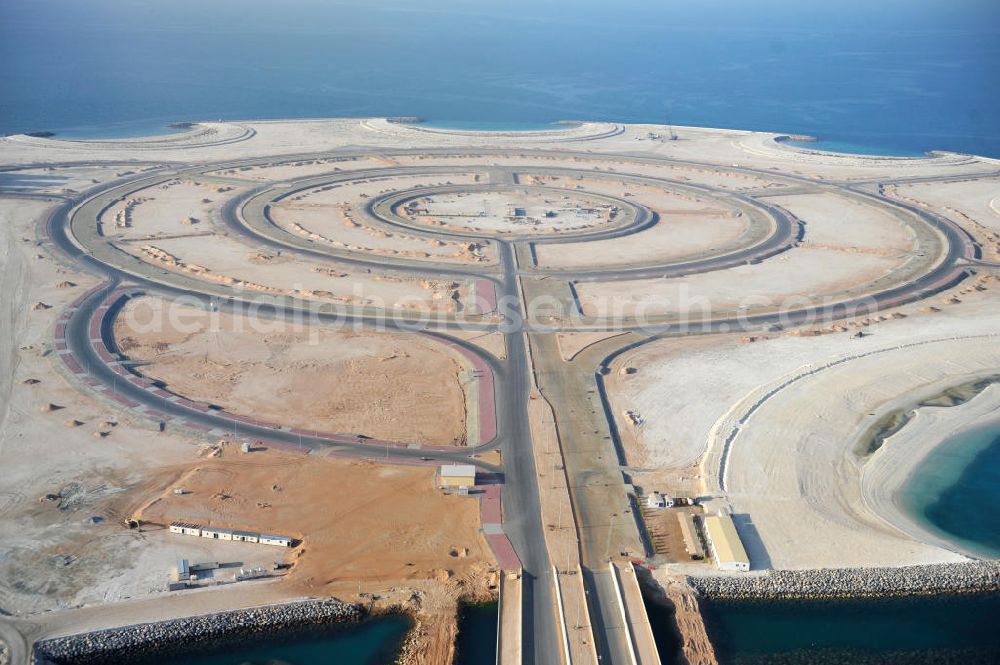 Aerial image Ras Al Khaimah - Al Marjan Island is an artificial archipelago in the arab emirate Ras Al Khaimah. It is part of the Al Hamra Village Project. In the future, the archipelago is meant to be the arterial road for the region's tourism