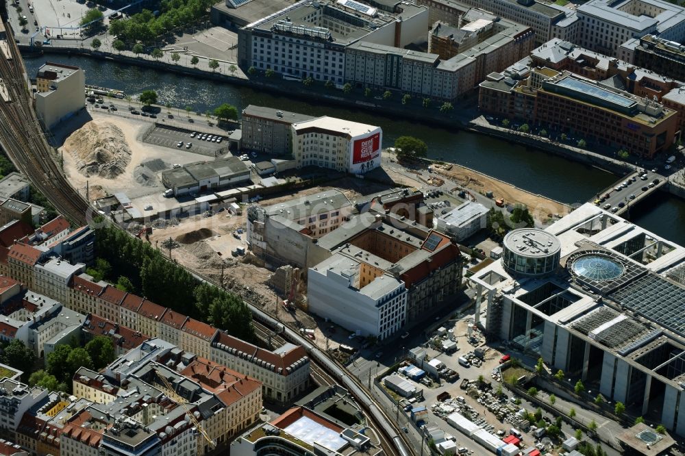 Berlin from the bird's eye view: Developing field of residential and commercial space on Schiffbauerdamm on Spree river in the district Mitte in Berlin, Germany