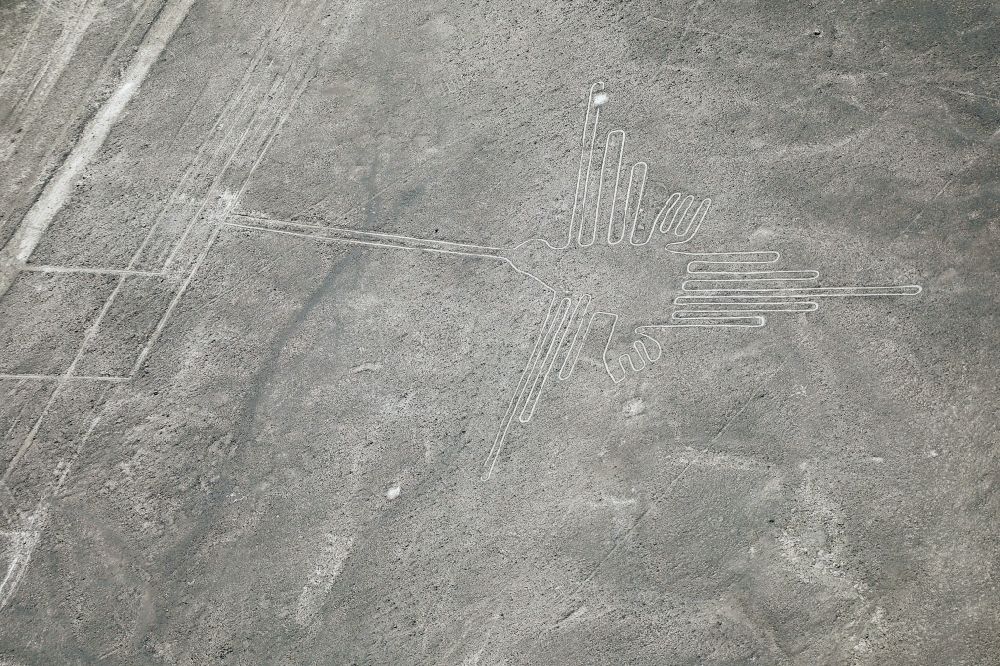 Espiral from the bird's eye view: Geoglyphic earth and soil drawing in the desert in Espiral in Ica, Peru