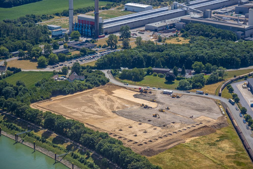 Aerial image Voerde (Niederrhein) - Construction site for the construction of a new building complex - logistics center of the company BEOS Logistics GmbH in Voerde (Lower Rhine) in the Ruhr area in the state of North Rhine-Westphalia, Germany