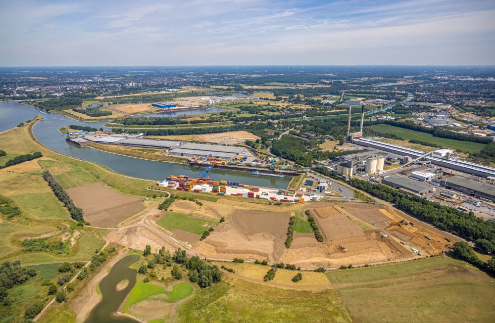 Voerde (Niederrhein) from the bird's eye view: Earthworks for the expansion of the container terminal in the container port of the Emmelsum inland port in Voerde (Lower Rhine) in the Ruhr area in the state of North Rhine-Westphalia, Germany
