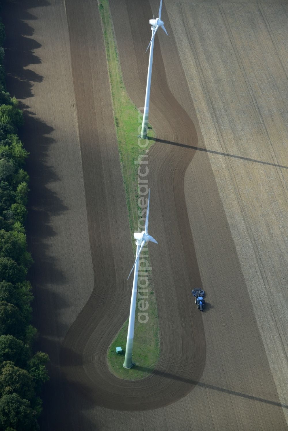 Kritzow from the bird's eye view: Wind turbine windmills on a field in Kritzow in the state Mecklenburg - Western Pomerania