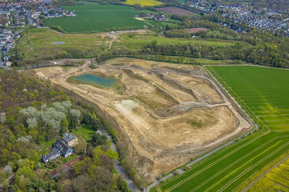Aerial photograph Holte - Construction site with development, priming, earthwork and embankment work for the construction of a new golf park on the Noerenbergstrasse in Holtein the state North Rhine-Westphalia, Germany