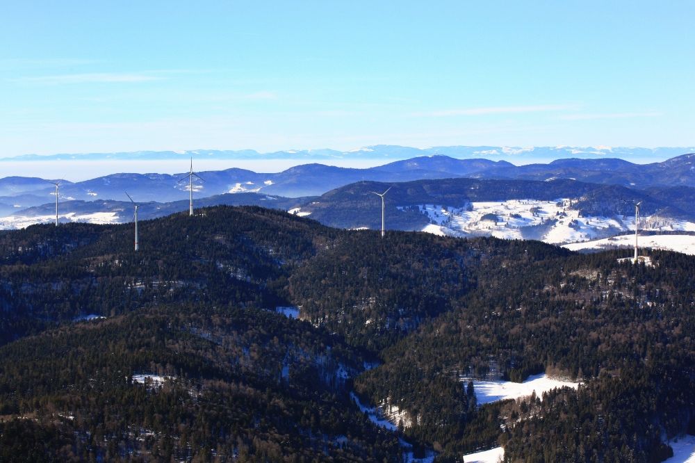 Aerial image Schopfheim - On the snow covered Rohrenkopf, the local mountain of Gersbach, a district of Schopfheim in Baden-Wuerttemberg, wind turbines have started operation. It is the first wind farm in the south of the Black Forest