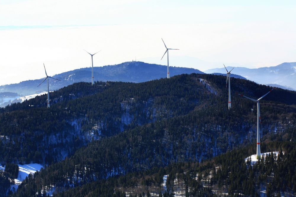 Aerial photograph Schopfheim - On the snow covered Rohrenkopf, the local mountain of Gersbach, a district of Schopfheim in Baden-Wuerttemberg, wind turbines have started operation. It is the first wind farm in the south of the Black Forest